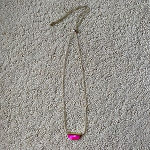 Kendra Scott necklace and matching bracelet in hot pink.